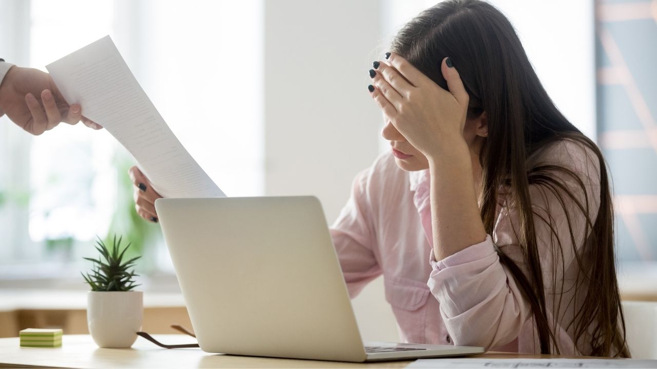 woman presented with paper